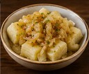 A11. Yuca Con Mojo (V)