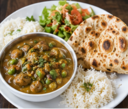 B7. Pahadi Mutter Mushroom, Rice, Salad, & Paratha Combo (V)